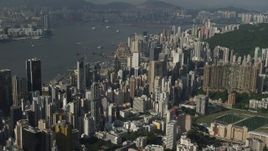 5K stock footage aerial video of skyscrapers on Hong Kong Island seen from the mountains, China Aerial Stock Footage | SS01_0095