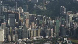 5K stock footage aerial video of rows of skyscrapers with billboards on Hong Kong Island, China Aerial Stock Footage | SS01_0104