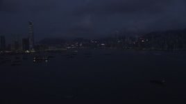 5K stock footage aerial video of skylines of Kowloon and Hong Kong Island at night, China Aerial Stock Footage | SS01_0123