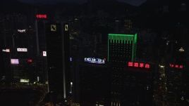 5K stock footage aerial video flyby high-rises on Hong Kong Island at nighttime in China Aerial Stock Footage | SS01_0136