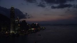 5K stock footage aerial video approach the end of Hong Kong Island and Victoria Harbor at night in China Aerial Stock Footage | SS01_0146