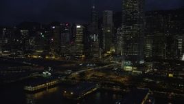 5K stock footage aerial video flyby piers and skyscrapers on Hong Kong Island at night, China Aerial Stock Footage | SS01_0149