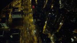 5K stock footage aerial video bird's eye view of a busy street and office towers at night in Hong Kong Island, China Aerial Stock Footage | SS01_0168