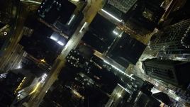 5K stock footage aerial video a bird's eye view of city streets and high-rises at night on Hong Kong Island, China Aerial Stock Footage | SS01_0172