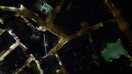 5K stock footage aerial video of a bird's eye view of heavy traffic on city streets at night on Hong Kong Island, China Aerial Stock Footage | SS01_0176