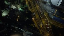 5K stock footage aerial video bird's eye of heavy traffic moving through Hong Kong Island at night, China Aerial Stock Footage | SS01_0179