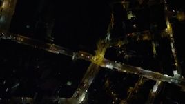 5K stock footage aerial video bird's eye of dimly lit and narrow streets at night on Hong Kong Island, China Aerial Stock Footage | SS01_0183