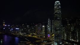 5K stock footage aerial video flyby International Finance Centre and waterfront towers at night on Hong Kong Island, China Aerial Stock Footage | SS01_0186