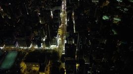 5K stock footage aerial video of flying over Nathan Road past office buildings at Night in Kowloon, Hong Kong, China Aerial Stock Footage | SS01_0194