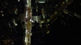 5K stock footage aerial video fly over office buildings by Nathan Road at night in Kowloon, Hong Kong, China Aerial Stock Footage | SS01_0197
