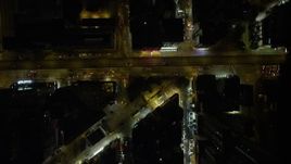 5K stock footage aerial video bird's eye of narrow streets at night through Kowloon, Hong Kong, China Aerial Stock Footage | SS01_0201