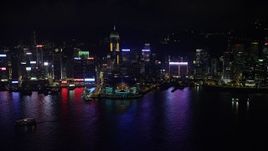 5K stock footage aerial video approach convention center and Central Plaza high-rise at night on Hong Kong Island, China Aerial Stock Footage | SS01_0202