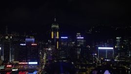 5K stock footage aerial video approach Central Plaza and neighboring high-rises at night on Hong Kong Island, China Aerial Stock Footage | SS01_0204