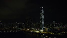 5K stock footage aerial video of International Commerce Centre skyscraper at night in Kowloon, Hong Kong, China Aerial Stock Footage | SS01_0230