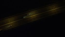 5K stock footage aerial video bird's eye view of freeway traffic on Lantau Island at night in Hong Kong, China Aerial Stock Footage | SS01_0271
