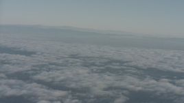 4K stock footage aerial video pan across clouds and mountain ridges in Ventura County, California Aerial Stock Footage | WA001_013