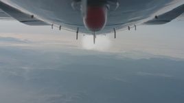4K stock footage aerial video of a view of the contrail from beneath the jet over the Los Padres National Forest, California Aerial Stock Footage | WA001_026