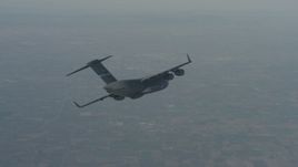 4K stock footage aerial video track a Boeing C-17 in flight over Solano County, California Aerial Stock Footage | WA001_034