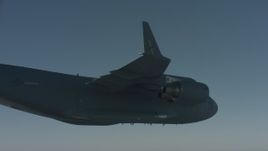 4K stock footage aerial video under the wing of a Boeing C-17, Solano County, California Aerial Stock Footage | WA001_039
