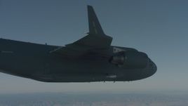 4K stock footage aerial video of a view of a Boeing C-17 from under the right wing, Solano County, California Aerial Stock Footage | WA001_040