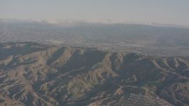 4K stock footage aerial video of approaching a ridge in the Santa Susana Mountains, California Aerial Stock Footage | WA002_005