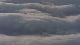 4K stock footage aerial video of a reverse view of cloud layer above the Central Valley, California Aerial Stock Footage | WA002_016