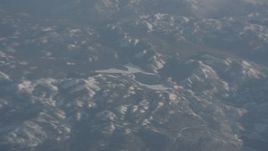 4K stock footage aerial video of an icy lake in the Sierra Nevada Mountains, California Aerial Stock Footage | WA002_042