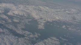 4K stock footage aerial video pan across clouds surrounding Lake Tahoe, California Aerial Stock Footage | WA002_068