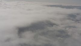 4K stock footage aerial video of reverse view of high altitude clouds over Lake County, Oregon Aerial Stock Footage | WA004_028
