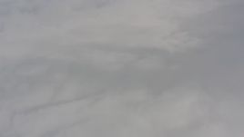 4K stock footage aerial video fly above white clouds over Lake County, Oregon Aerial Stock Footage | WA004_029