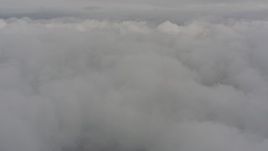 4K stock footage aerial video fly over white clouds above Washington Aerial Stock Footage | WA004_035