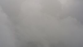 4K stock footage aerial video flyby dense cloud cover over Washington Aerial Stock Footage | WA004_043