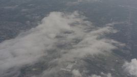 4K stock footage aerial video fly over misty clouds over Snohomish County, Washington Aerial Stock Footage | WA004_058