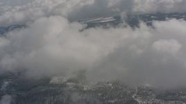 4K stock footage aerial video approach clouds over snowy forests in Washington Aerial Stock Footage | WA004_087