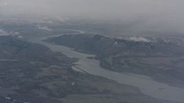 4K stock footage aerial video approach the Columbia River and mountains between Washington and Oregon Aerial Stock Footage | WA004_096