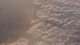 4K stock footage aerial video of a bird's eye view of clouds over ocean at sunset by Long Beach, California Aerial Stock Footage | WA005_011
