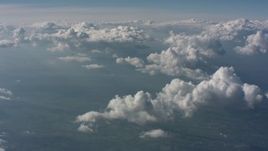4K stock footage aerial video tilt from a bird's eye of mountains to a view of clouds above West Virginia Aerial Stock Footage | WA005_096