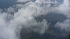 4K stock footage aerial video flyby and pan across clouds over Virginia Aerial Stock Footage | WA006_007