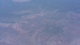 4K stock footage aerial video tilt from a river in the desert to reveal mesas in Arizona Aerial Stock Footage | WA007_025