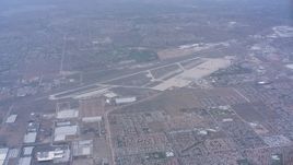 4K stock footage aerial video approach the the March Joint Air Reserve Base, Riverside, California Aerial Stock Footage | WA007_035