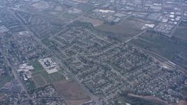 4K stock footage aerial video of residential neighborhoods and schools in Norco, California Aerial Stock Footage | WA007_043