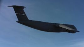 4K stock footage aerial video of a Lockheed C-5 and blue skies, Northern California Aerial Stock Footage | WAAF01_C005_0117RV