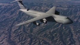 4K stock footage aerial video of flying by the front end of a Lockheed C-5 flying over hills, Northern California Aerial Stock Footage | WAAF01_C015_0117VN