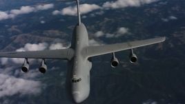 4K stock footage aerial video flyby front of a Lockheed C-5 jet in Northern California Aerial Stock Footage | WAAF01_C040_0117SL