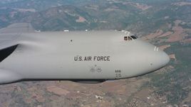 4K stock footage aerial video of the front end and cockpit of a Lockheed C-5 over Northern California Aerial Stock Footage | WAAF01_C071_0117GR