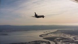 4K stock footage aerial video of a McDonnell Douglas KC-10 over Suisun Bay, California Aerial Stock Footage | WAAF03_C005_01186V