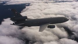 4K stock footage aerial video of a McDonnell Douglas KC-10 flying over clouds in Northern California Aerial Stock Footage | WAAF03_C033_011806