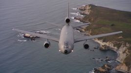 4K stock footage aerial video of a reverse view of a McDonnell Douglas KC-10 flying by the coast of Northern California Aerial Stock Footage | WAAF03_C053_01188P