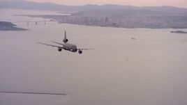 4K stock footage aerial video of a McDonnell Douglas KC-10 in flight near San Francisco, California at sunset Aerial Stock Footage | WAAF03_C061_011840