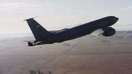 4K stock footage aerial video of a Boeing KC-135 in flight near Travis Air Force Base, California Aerial Stock Footage | WAAF04_C007_01187P_S000